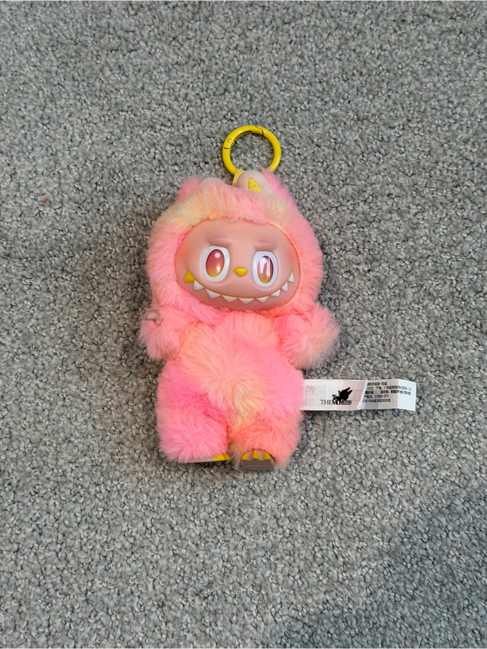 Plush Pink Fuzzy Monster Keychain with Yellow Accents